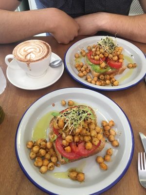 Vegan toast and the cappuccino! 😍 at Julia Bakery in Malaga