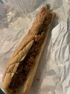 Fried oyster mushroom poboy, it was HUGE!!!! This can serve like 3-4 people   at Vegan Friendly Foods in Baton Rouge