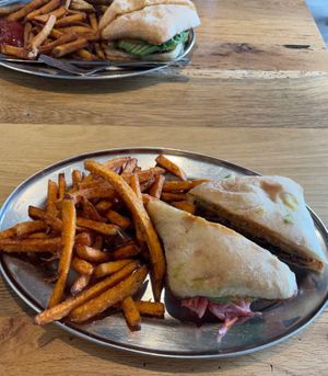 Kimchi reuben (made vegan) with sweet potato fries at Green Sage Cafe - Broadway in Asheville