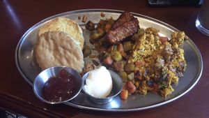 Biscuit, tempeh bacon, tofu scramble, and hash.  at Green Sage Cafe - Broadway in Asheville