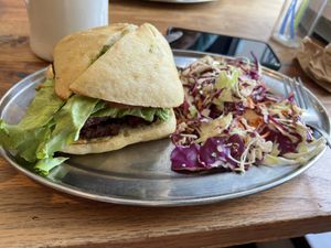 Tempeh TLT with sesame ginger slaw  at Green Sage Cafe - Broadway in Asheville