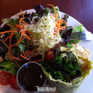hummus wrap with house salad at Green Sage Cafe - Broadway in Asheville