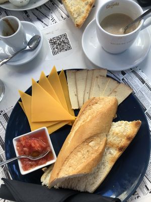 bread with tofu, cheese and tomatoes  at Cafe Madrigal in Valencia