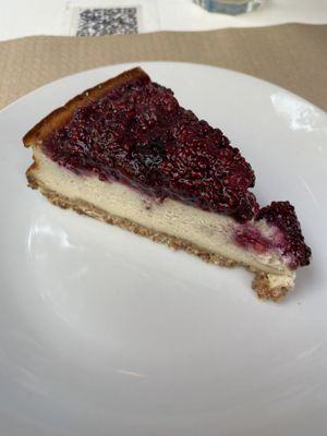 cheesecake with red berries  at Cafe Madrigal in Valencia