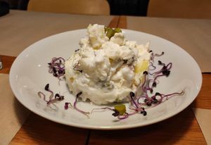 Ensaladilla alemana (patata, pepinillos y tofú). at Cafe Madrigal in Valencia