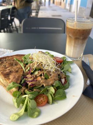Smoked tofu and onion quiche with salad   at Cafe Madrigal in Valencia