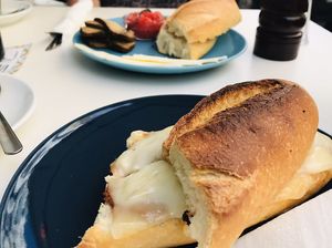 Wonderful tasty melted cheese and caramelised onion toastie!  at Cafe Madrigal in Valencia