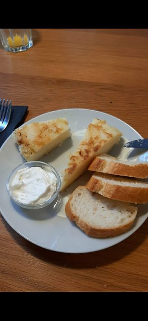 tapa de tortilla de patatas con allioli con zumo de naranja natural at Cafe Madrigal in Valencia