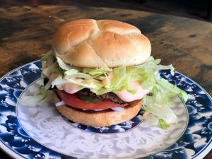 Messy Bam Burger ~ thin double patty w/ cheese, mayo, lettuce, tomatoes, pickles, onions and Tickle sauce.  at Hang Space in Richmond