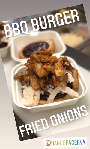 BBQ Burger ~ beyond patty, bbq sauce, slaw and house made crispy fried onions served on a Brioche bun. at Hang Space in Richmond