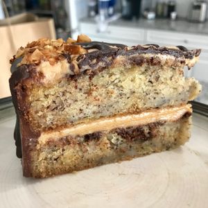 Memphis Mafia Cake: cinnamon-swirled banana cake, peanut butter, chocolate frosting, coconut bacon, chocolate ganache. Incredible! at Hang Space in Richmond