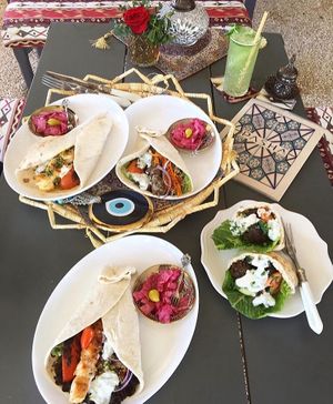 Vegetarian Wraps in vegan bread with vegan falafel additional vegan hummus and tahini  at Pasha in Tulum