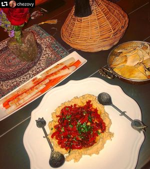 Vegan hummus topped with extra sweet peppers  at Pasha in Tulum