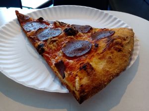 Slice of pepperoni pizza at Screamer's Pizzeria - Crown Heights in Brooklyn