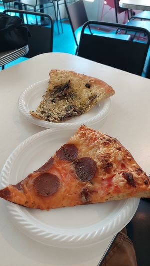 Pepperoni & mushroom slices at Screamer's Pizzeria - Crown Heights in Brooklyn