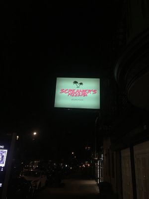 A glowing beacon of vegan pizza at Screamer's Pizzeria - Crown Heights in Brooklyn