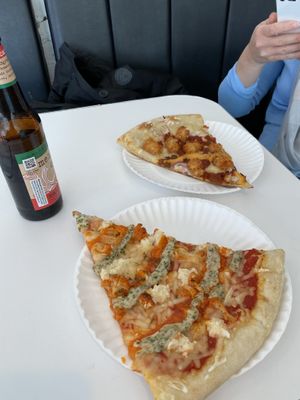 The pizza in the back have vegan nacho cheese on it. OMG! Both delicious   at Screamer's Pizzeria - Crown Heights in Brooklyn