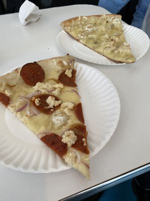 The vegan pepperoni tastes really good. The white in the back is perfect for all “cheese”-lovers   at Screamer's Pizzeria - Crown Heights in Brooklyn