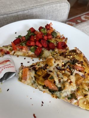 Vegan chilli & tandoori chicken pizza  at Bossman's Pizza in San Jose