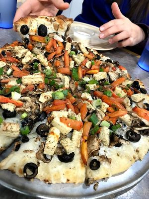 Vegan Garlic Chicken Pizza and  at Bossman's Pizza in San Jose