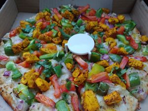 $23.00 10' Vegan Tika Masala Pizza 🍕 and two sides of vegan ranch at Bossman's Pizza in San Jose