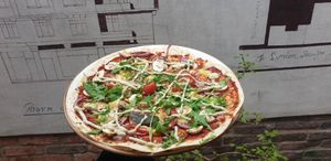 Podpłomyk z wegańskim serem at Chwast Prast in Torun