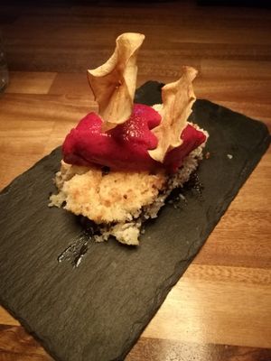 Chocolate cake with coconut crust and lingonberry sorbet. at The Herbivore  in Lund