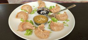 Chef's sign dumplings at Bodhi Greens in Arambol