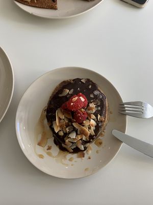 Oat/banana pancakes with choc, pb, berries and coconut   at Maria Limão in Lisbon