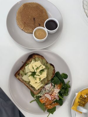 Avocado paste toast and pancake with salted caramel and chocolate sauce.  at Maria Limão in Lisbon
