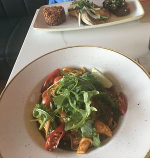 The seafood linguine and the steak behind it  at Twelve Eatery in Bournemouth