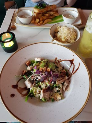 Battered tofu, chicken caesar salad and mac n cheese at Twelve Eatery in Bournemouth
