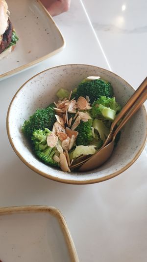 Garlic, lemon and almond broccoli! Delicious! at Twelve Eatery in Bournemouth