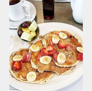 Vegan pancakes there come with bananas and strawberries. at Turning Point in Lawrence Township