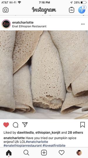 Soft spongy thin bread to garb up your food called Enjera/injera  at Enat in Charlotte