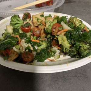 Build your own bowl (kale salad,broccoli, minted tomatoes, tofu, cilantro & spicy dressing). at Bolay in Gainesville