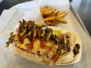 Beyond meat sausage with grilled onions, mushrooms, sauerkraut, relish and tomatoes  at Botsky's in Lake Charles