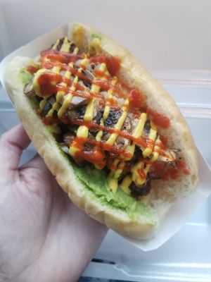 The Not Dog.. beyond sausage, pineapple, pickle, jalapenos, mushrooms and mustard!! at Botsky's in Lake Charles