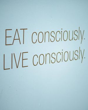 The restaurant's motto on their wall at The Milkman's Daughter in Mermaid Beach