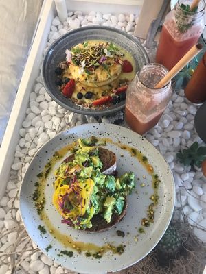 Vegan lemon curd pancakes with custard and vegan avo toast at The Milkman's Daughter in Mermaid Beach