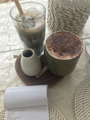 Ice charcoal latte & capuccino  at The Milkman's Daughter in Mermaid Beach