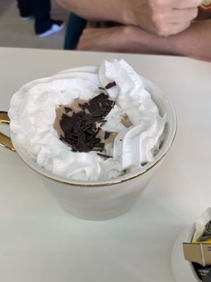 Hot chocolate with cream  at Naked Bakery in Edinburgh