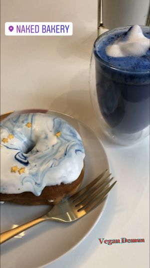 Vanilla doughnut and blue latte (blue spirulina powder and frothed milk, sounds a bit odd but so delicious) at Naked Bakery in Edinburgh