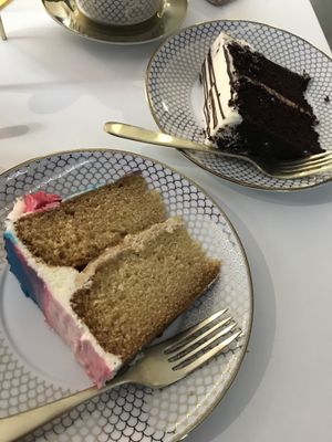 Biscoff layer cake (front) and chocolate and honeycomb layer cake (back) at Naked Bakery in Edinburgh