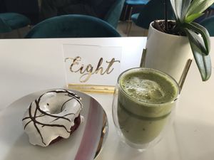 Red velvet donut with a matcha latte! Their baked goods are to die for  at Naked Bakery in Edinburgh