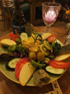 Huge salad! A little on the "Korean" side (mixing fruit like kiwi with savory hummus and olives) but tasty none-the-less! at HOME Bistro and Cafe in Busan