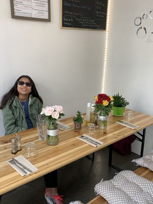 Flowers adorn the table  at Mon Resto Sans Gluten in Paris