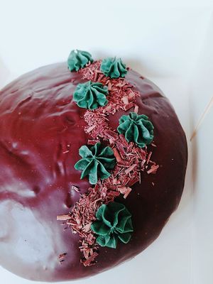 Simple hard ganache cake with decor :) at Sweets by Pepper in Geneva