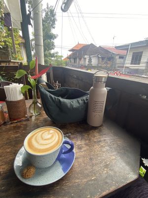 Cappuccino with a view (they told me the cookie was vegan as well. Not super sure about that though)  at Kafe in Ubud