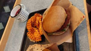 Swing burger with side of sweet potatoes at Swing Kitchen - Rosenthalerstraße in Berlin
